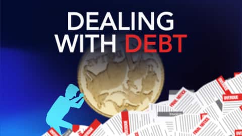 Image of a cartoon pushing a dollar coin up a mountain of bills with the caption 'dealing with debt'. 