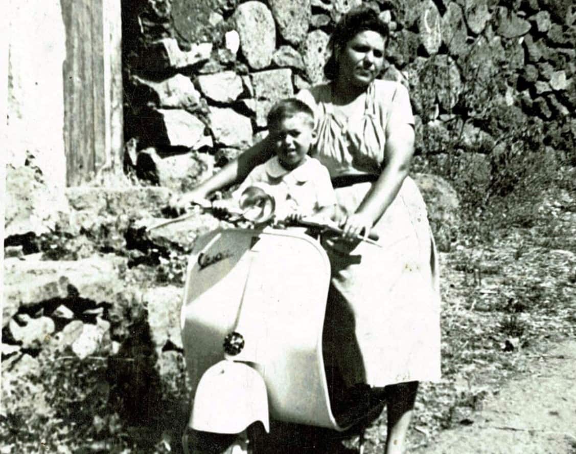 John Samperi as a child in 1954 with his mum on a Vespa in Mascali, his hometown.