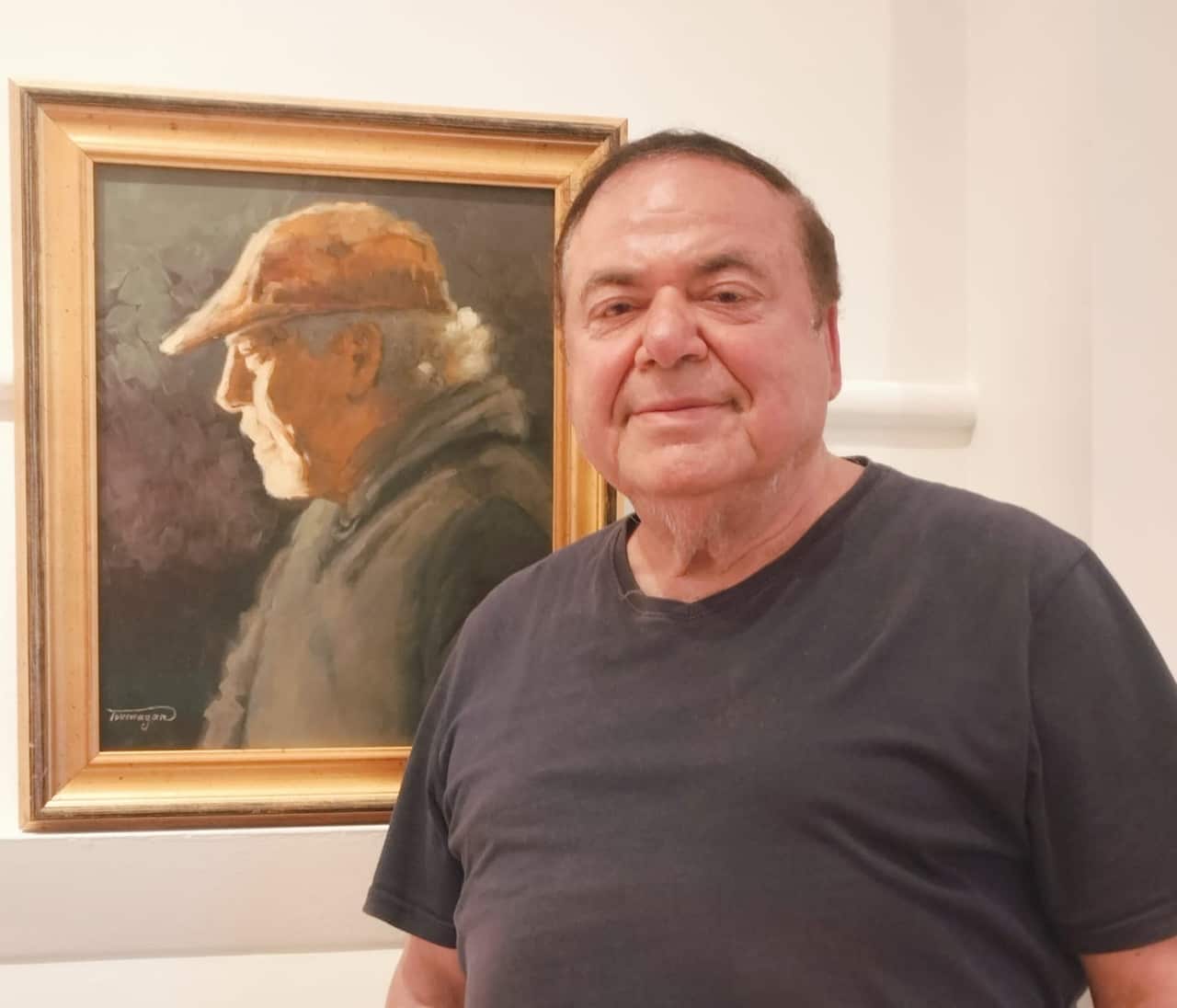 Fouad Tpmayan  with Painting.JPG