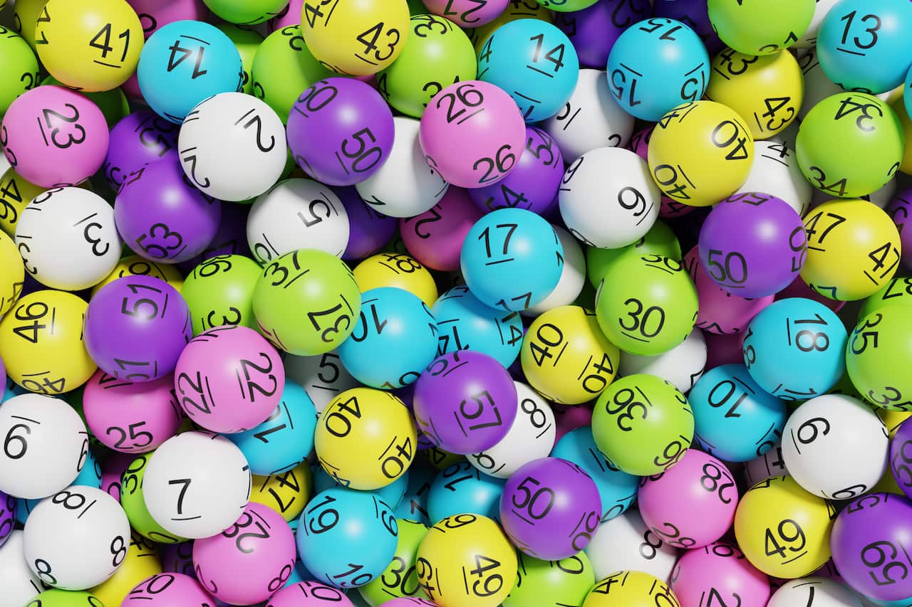 A pile of colourful balls with numbers on them.