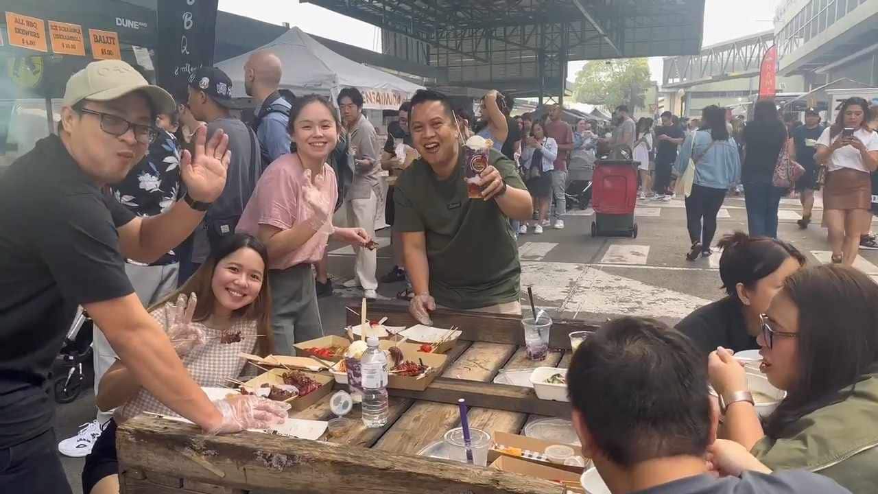 Filipinos enjoying the food..jpg