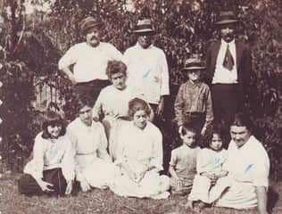 Ally Bahadur Khan (centre with hat) with his friends and family.