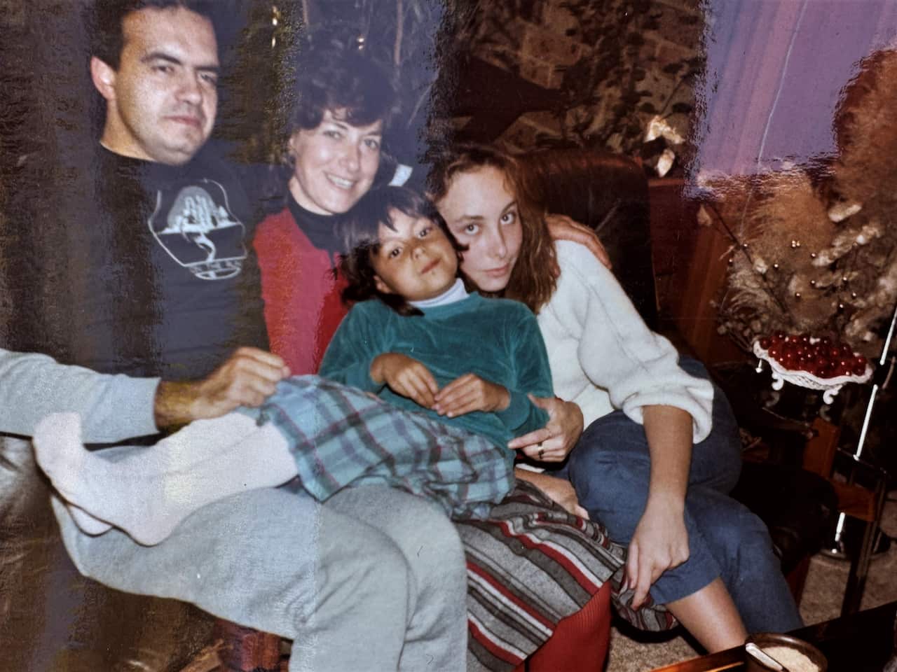 Vincenzo and Elaine with their daughters Cassandra and Lisa in the early 1980s.