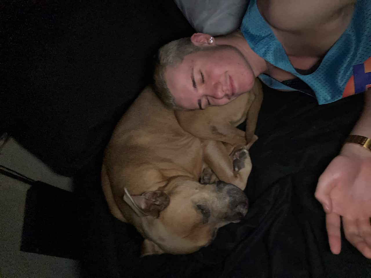 Brayden spends time with his dog Nala. 