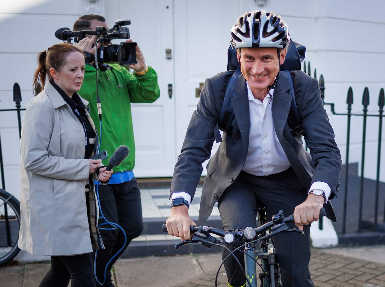 Jeremy Hunt departs from his London home on a bike, the morning after Boris Johnson survived a confidence vote on 7 June 2022.   