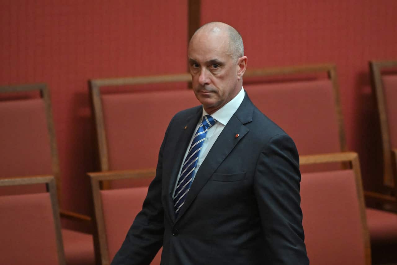 Man in suit and tie.