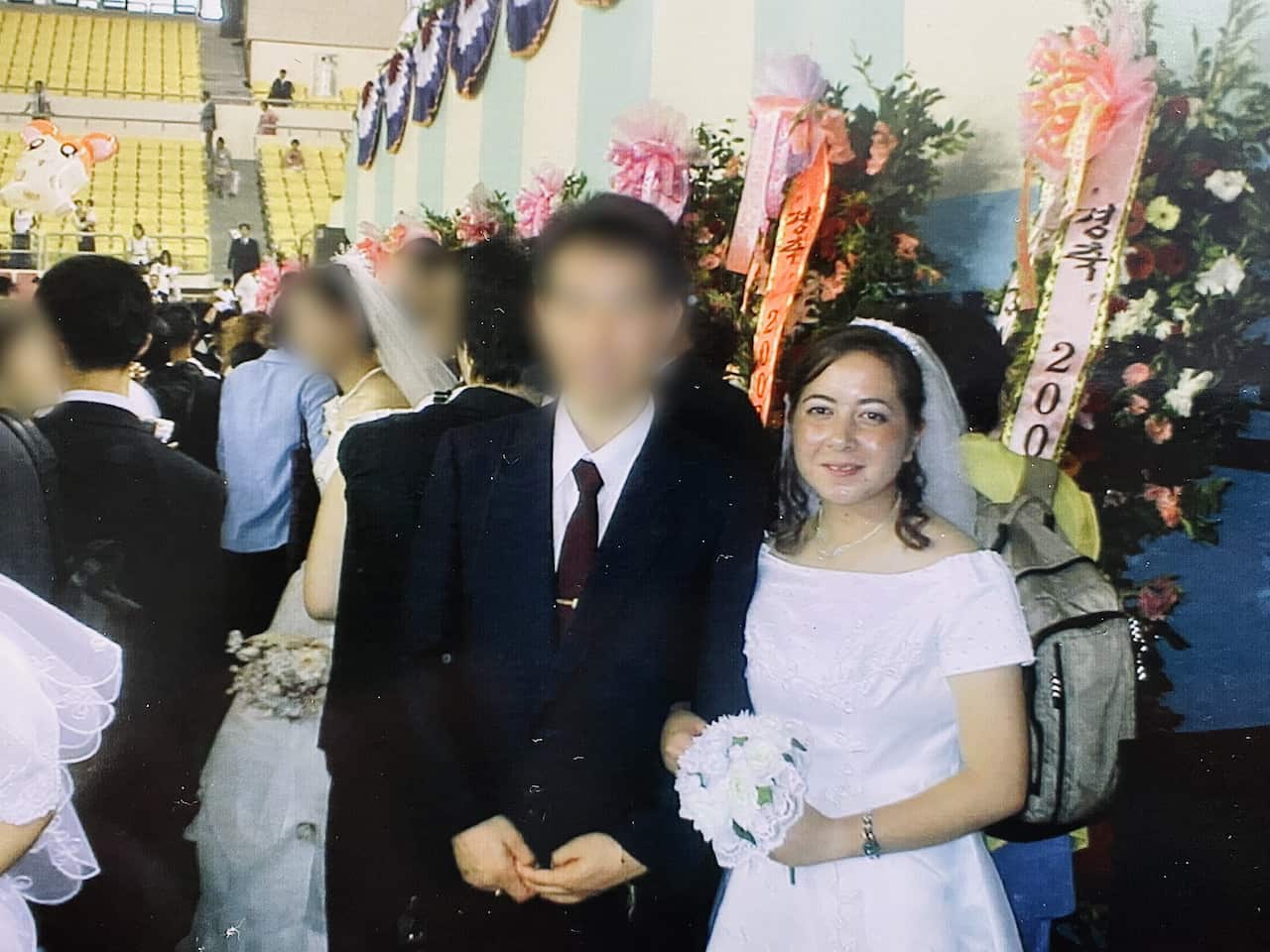 A woman in a wedding dress.