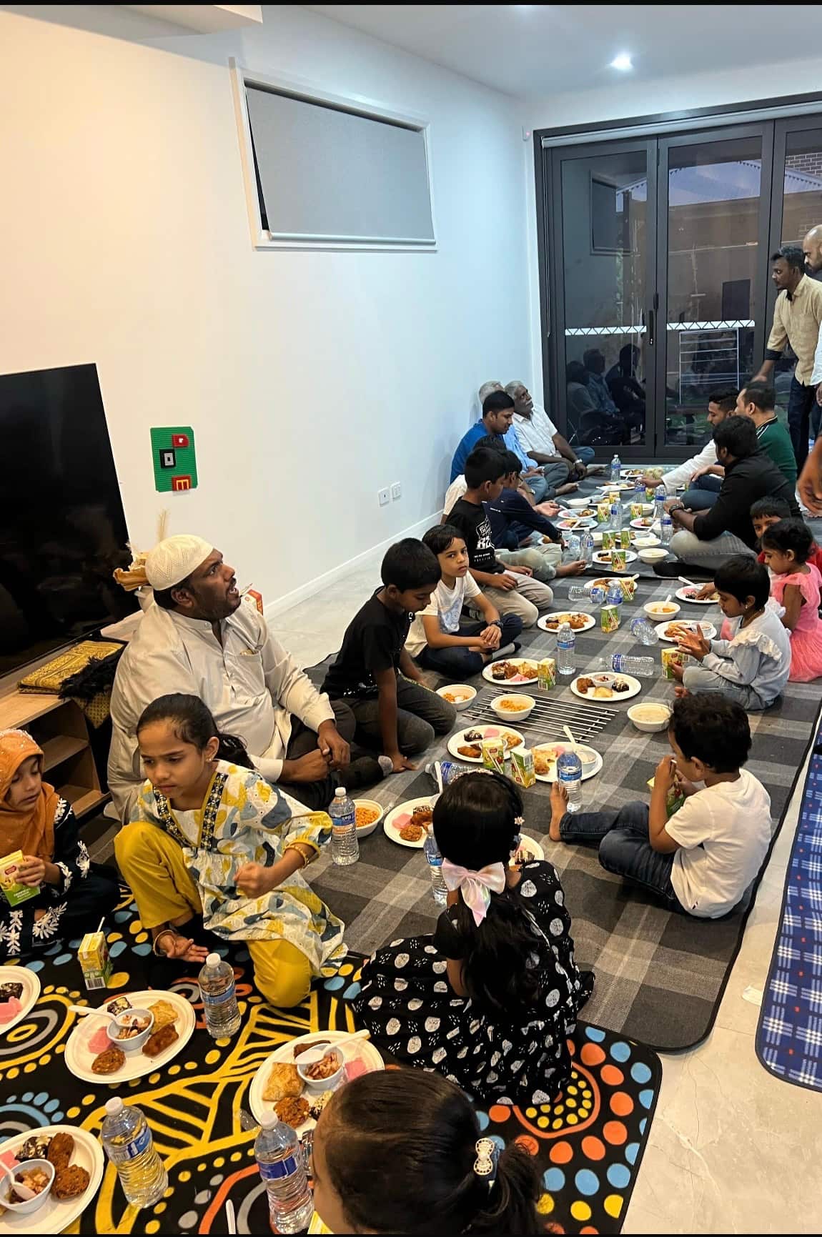 Family enjoying iftar during Ramadan in Brisbane