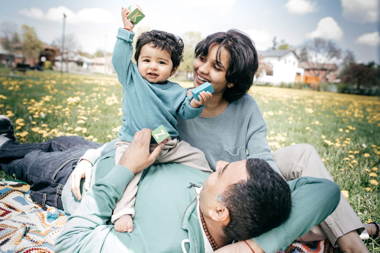 Happy family of three