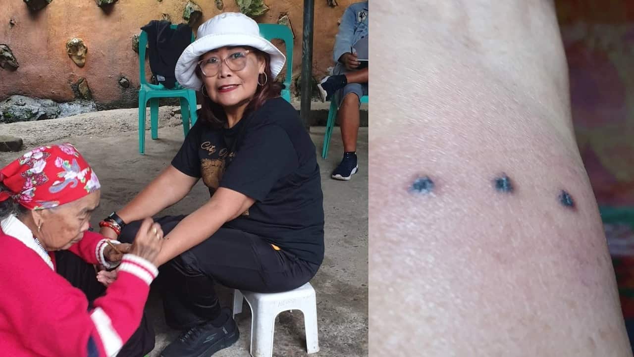 Violi's Three-dot tattoo.jpg