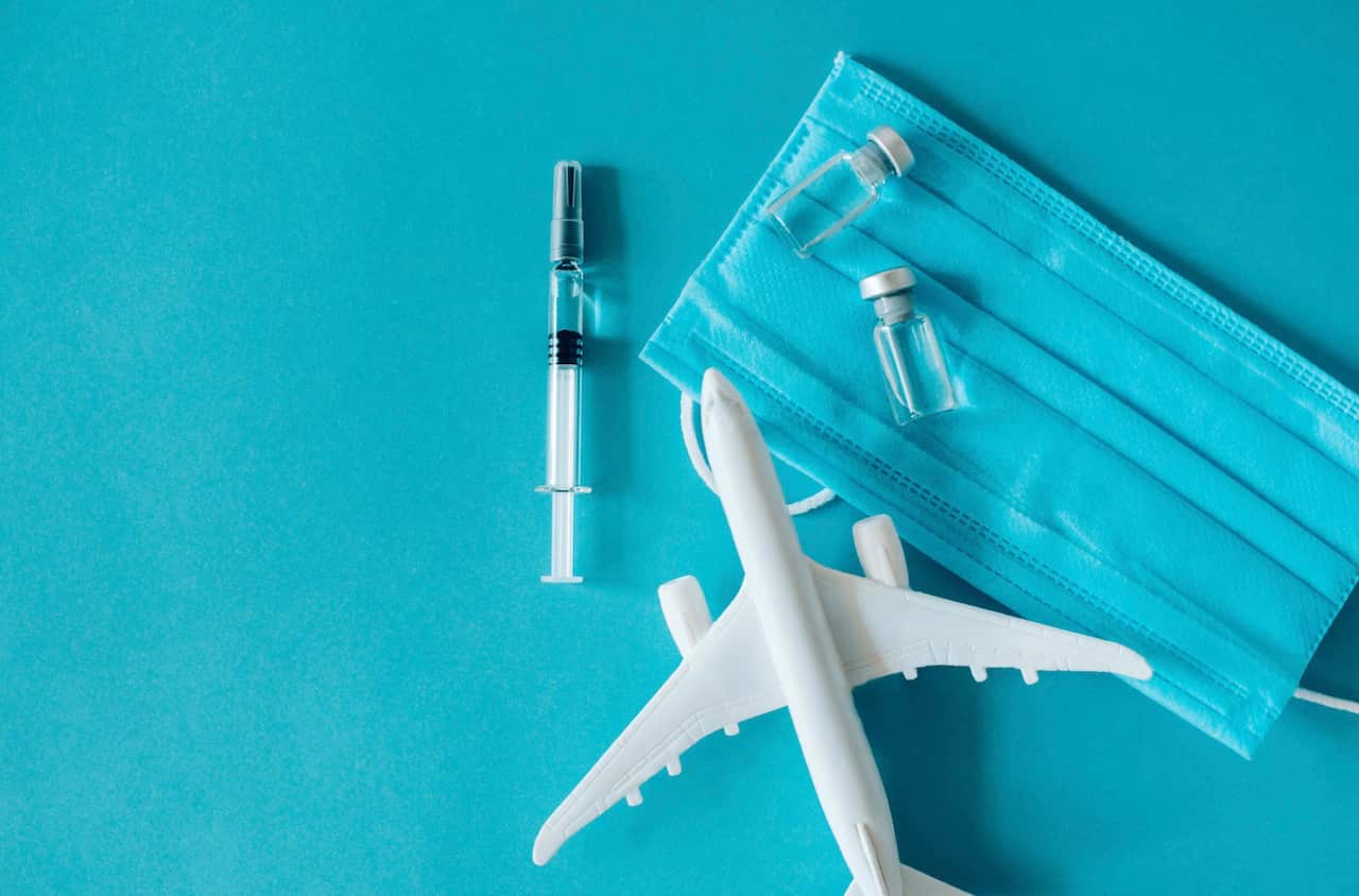 Plane and vaccine Getty Images.jpg