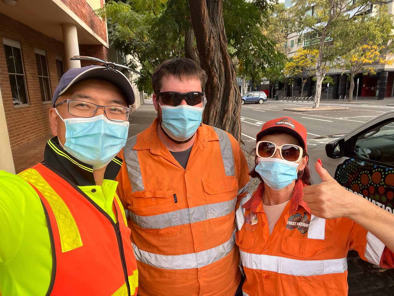 chinese traffic controller michael guo with colleagues.png