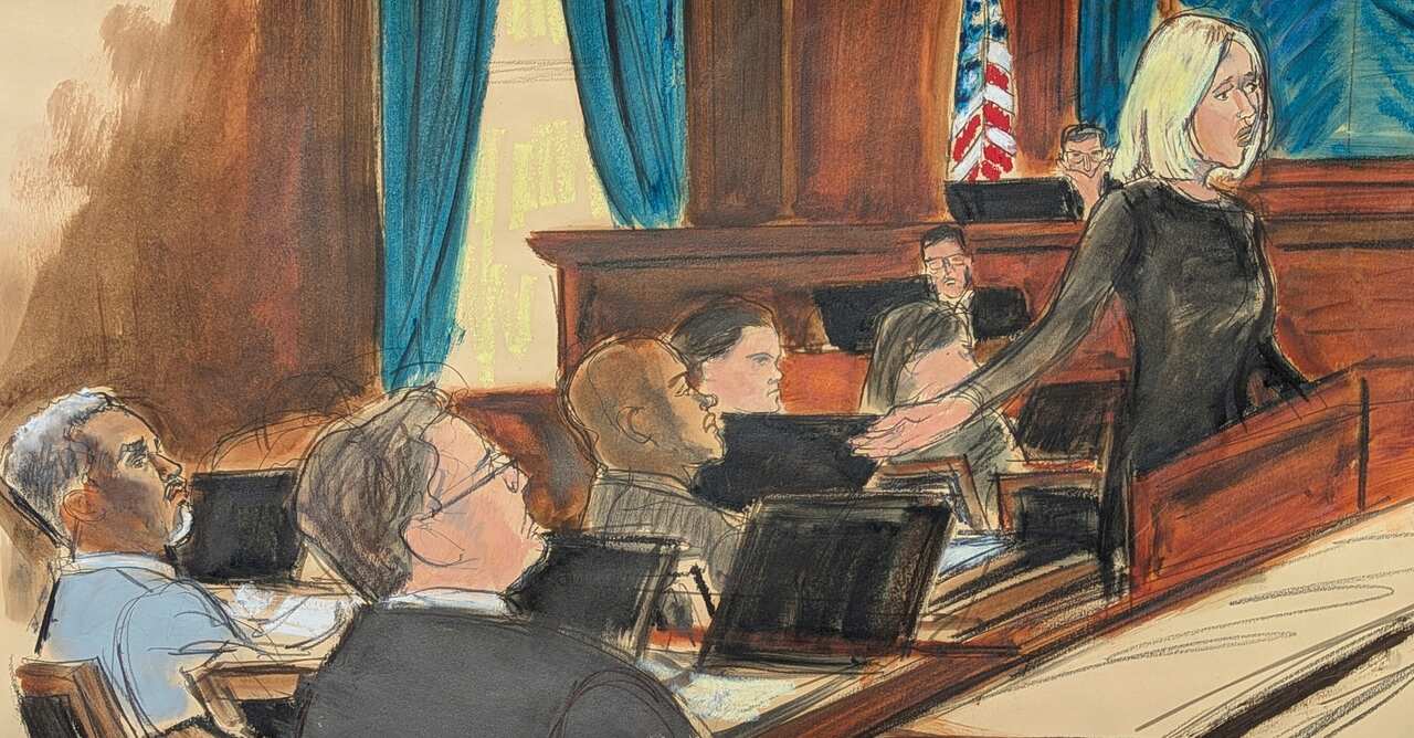 A court drawing of a trial features a woman gesturing with her hand as she speaks. People are sitting behind her in rows in front of laptops and looking up at her.