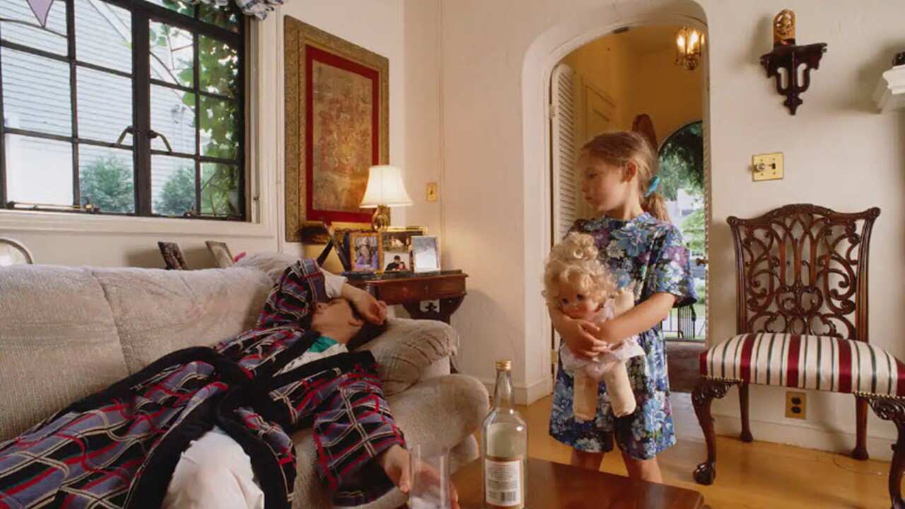 Having a parent that suffers from alcohol abuse issues may deeply impact a child's development and overall life.jpg