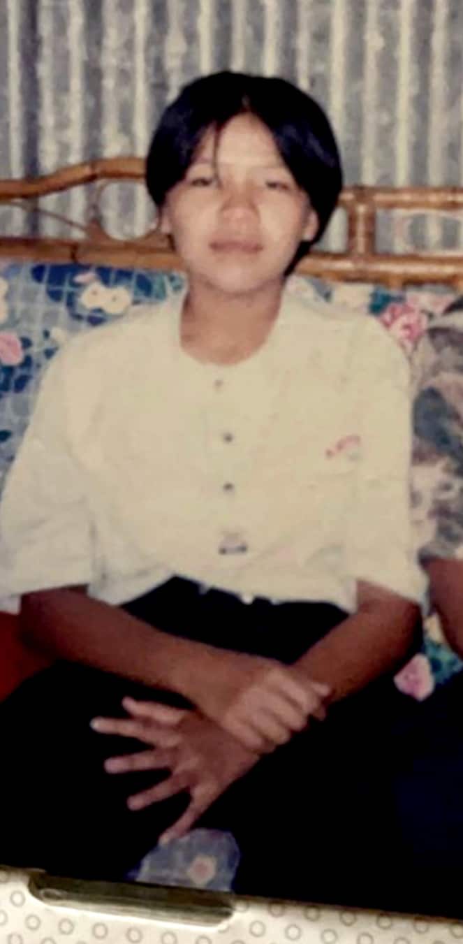 A photo of Tiff as a young person in Malaysia. 