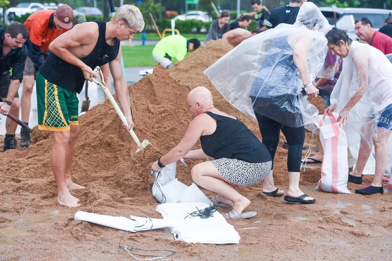 People filling sandbags