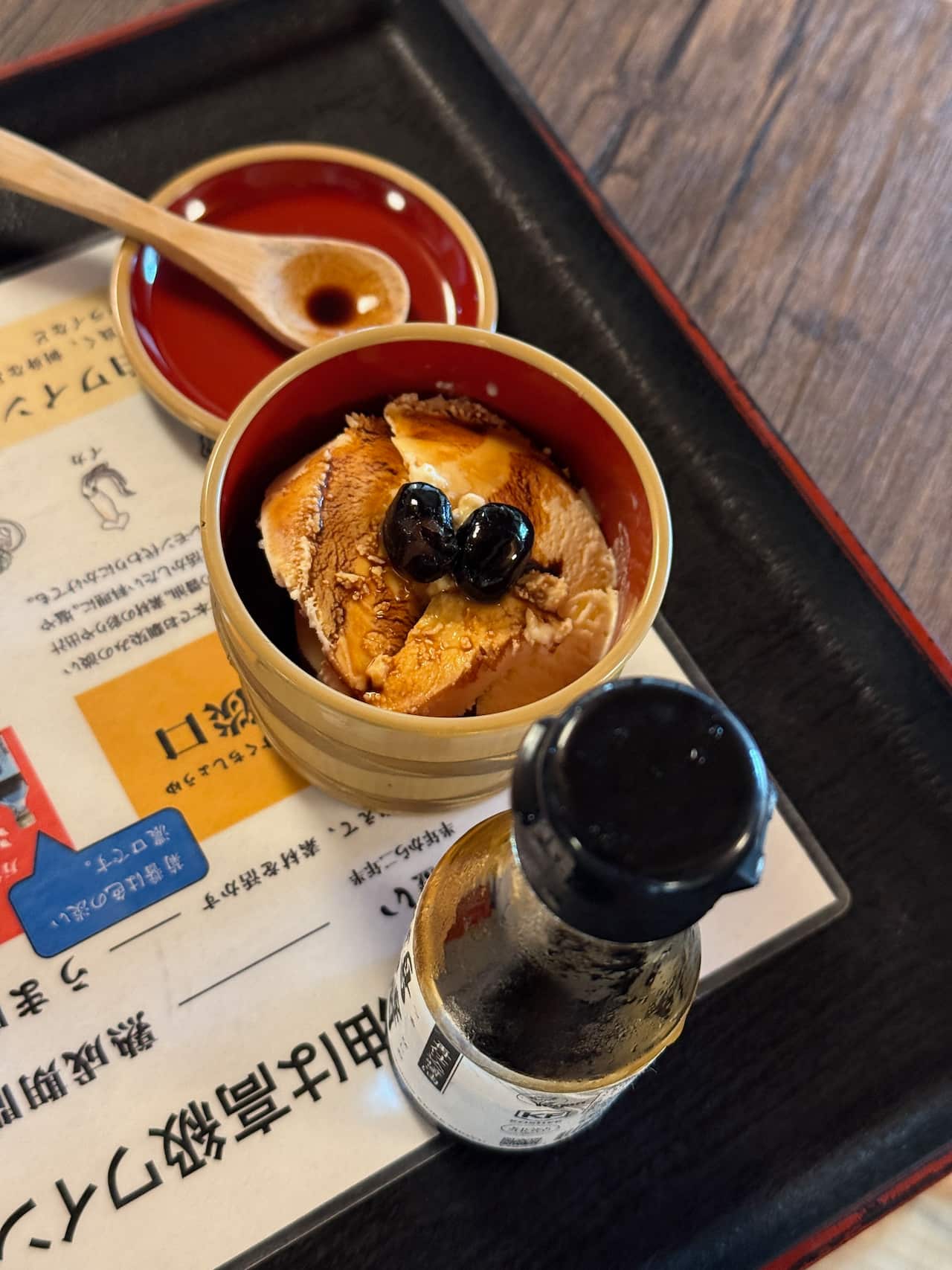 Trying soy sauce with ice cream inside the tea house - Lee Tran Lam.jpeg