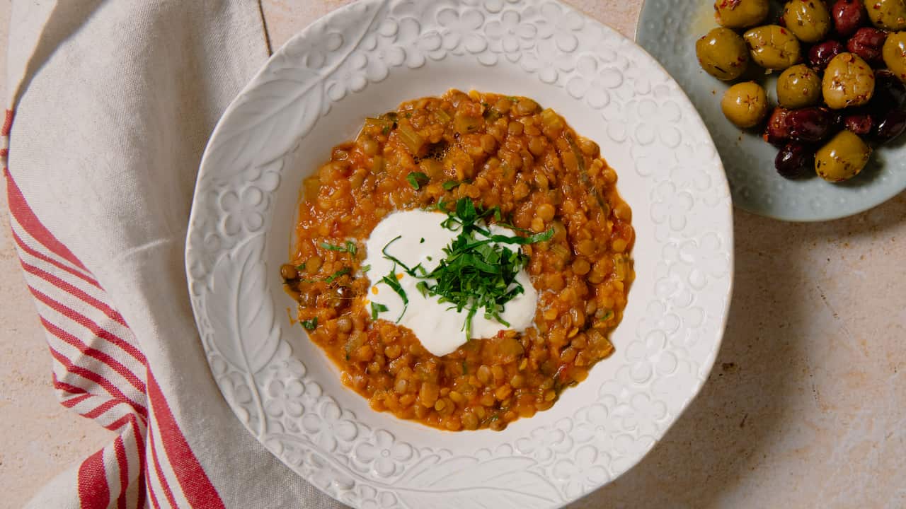 Lentil soup with garlic yogurt