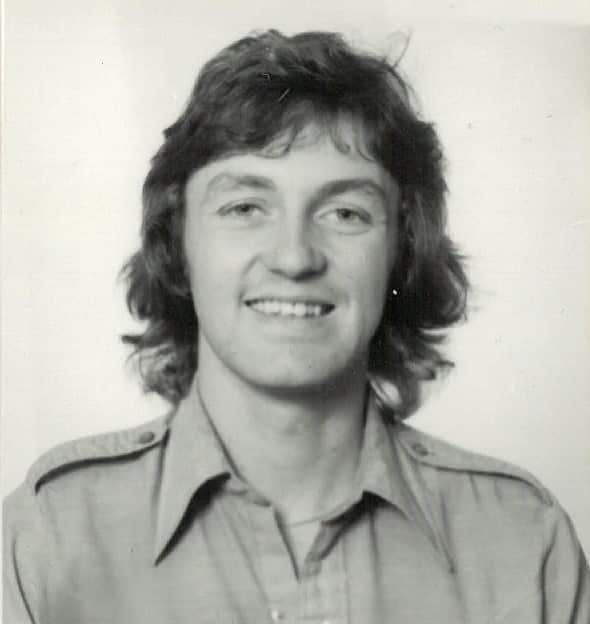 A black and white picture of a man