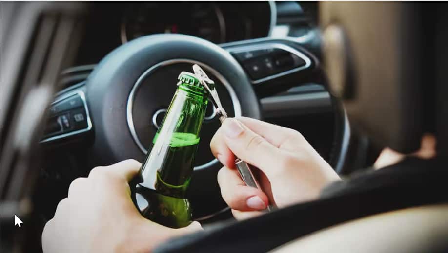 Drinking water at the wheel on 39-degree day lands Brisbane driver $173 fine.png