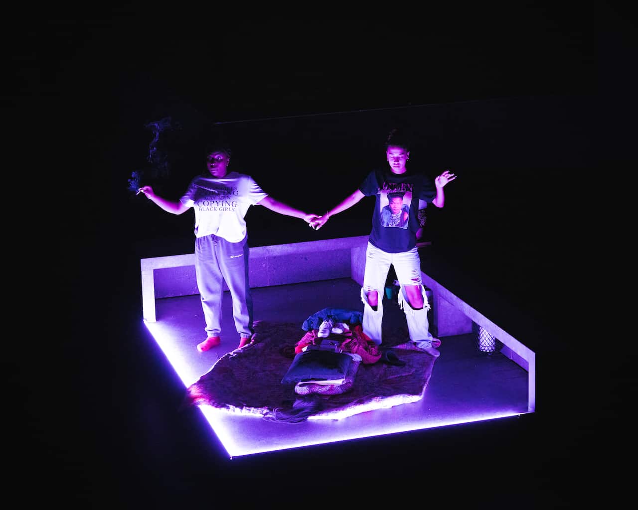 Chika Ikogwe and Iolanthe on a stage