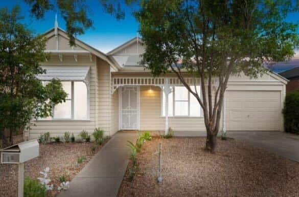 A white weatherboard house.