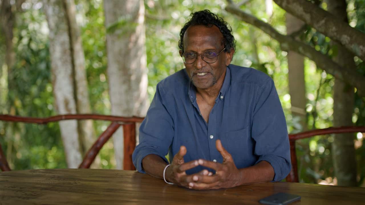 A man sitting at a table.