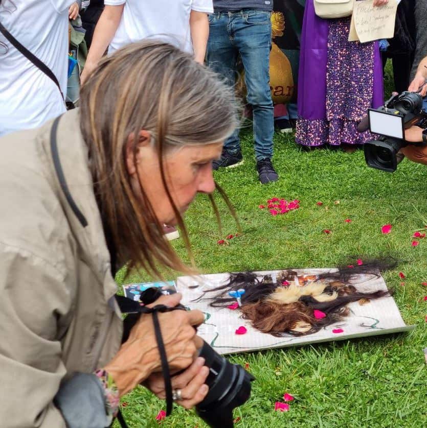 A journalist taking photos.JPG