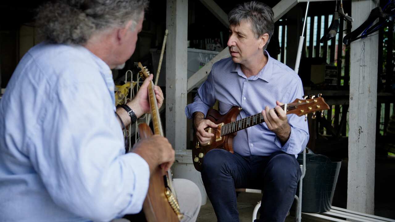 Gary and Tony Davies playing some of Gary's guitars together.