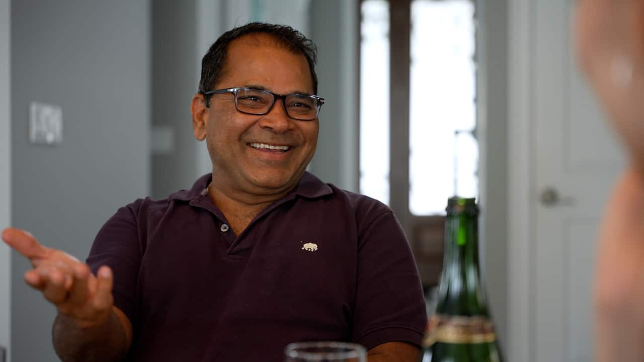 A man wearing glasses.