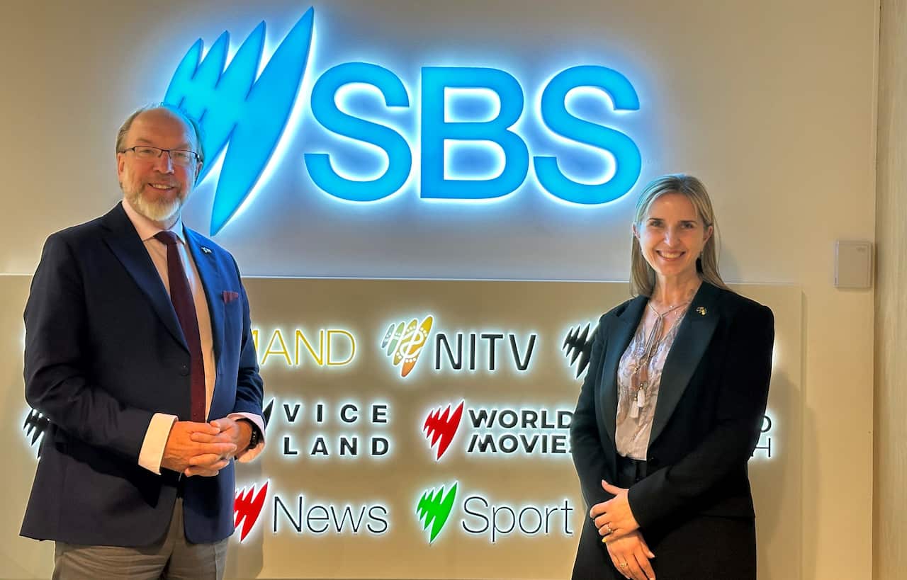 President of The Ukrainian Chamber of Commerce and Industry Gennadiy Chyzhykov and Khrestyna Kmetj from the Australian Federation of Ukrainian Organisations. (2).jpeg