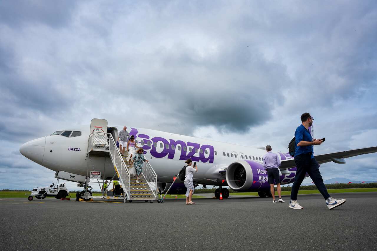 People disembarking a plane.
