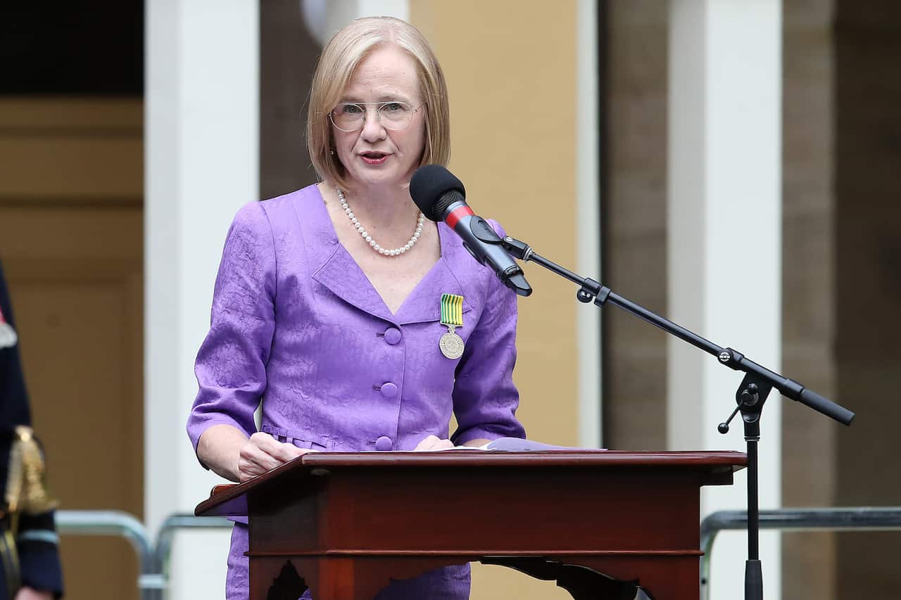 Dr Jeannette Young speaking from behind a lectern 