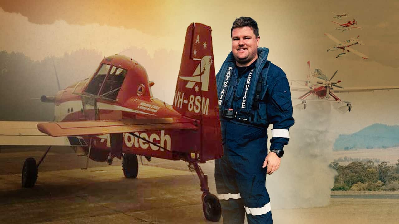 Pilot Alex in a blue flight suit next to a "Fire Boss" red fixed wing plane while behind them, another fire boss dumps water onto grassland. The composite image is covered in a smokey haze.