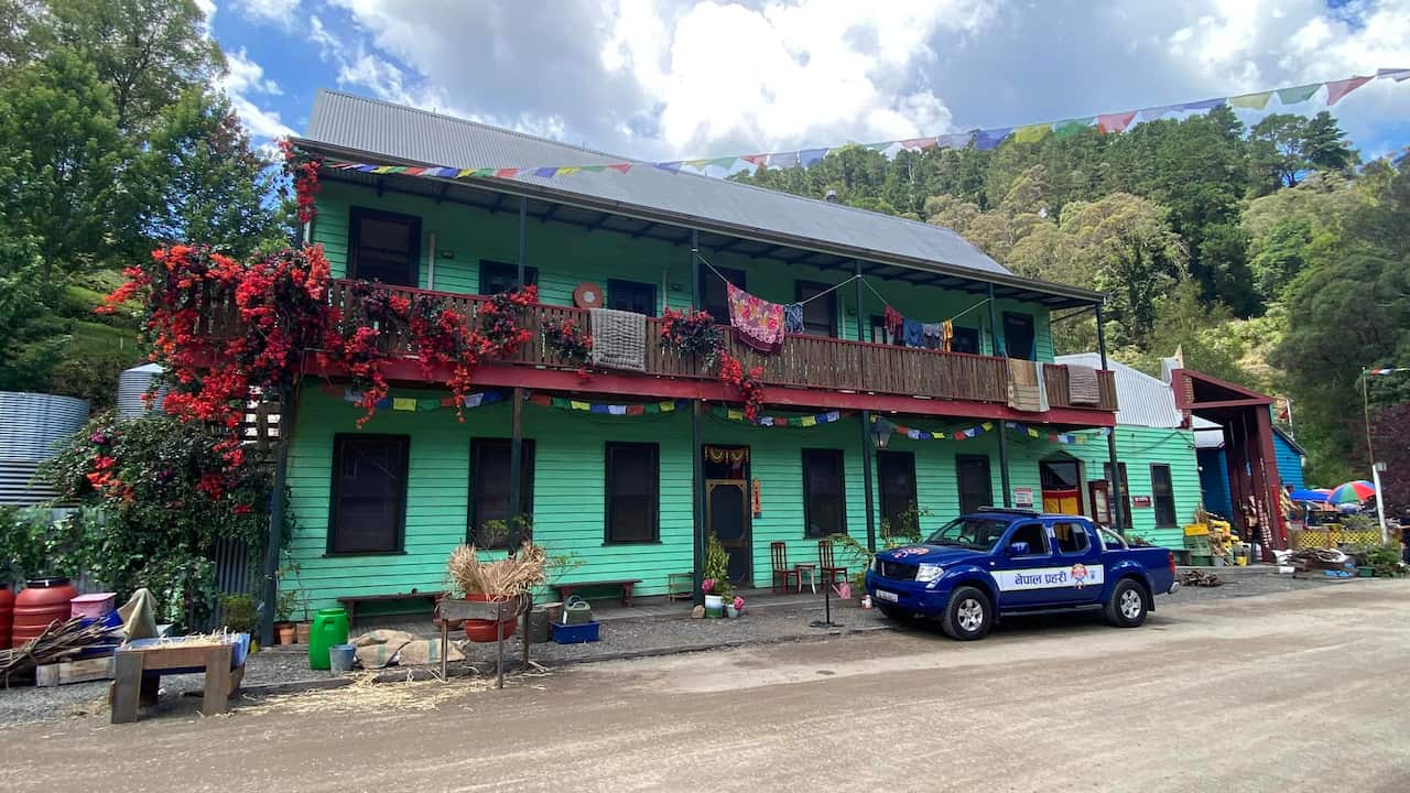 Walhalla's Star Hotel has been painted and decorated to resemble a Nepali village house, with a jeep written 'Nepal Police' parked in the front.