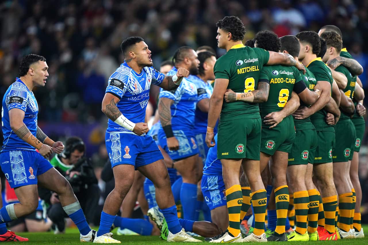 The Samoan team performs the Siva Tau before the Rugby League World Cup final