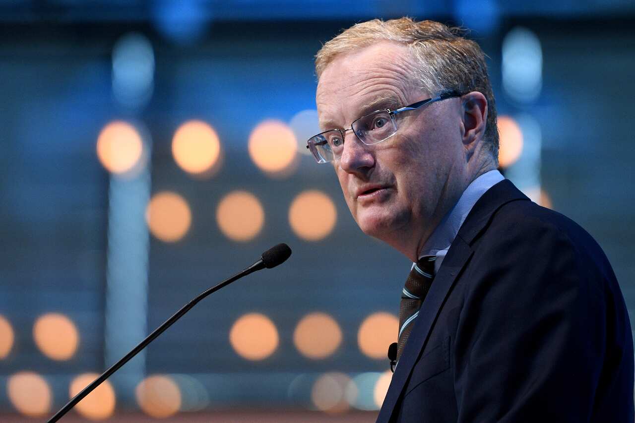 A man in glasses and a suit