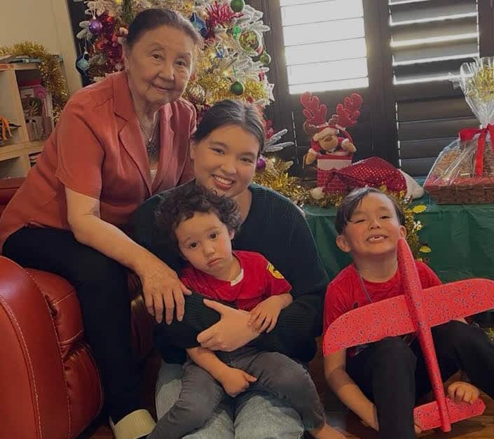 Lin with three grandchildren.jpg