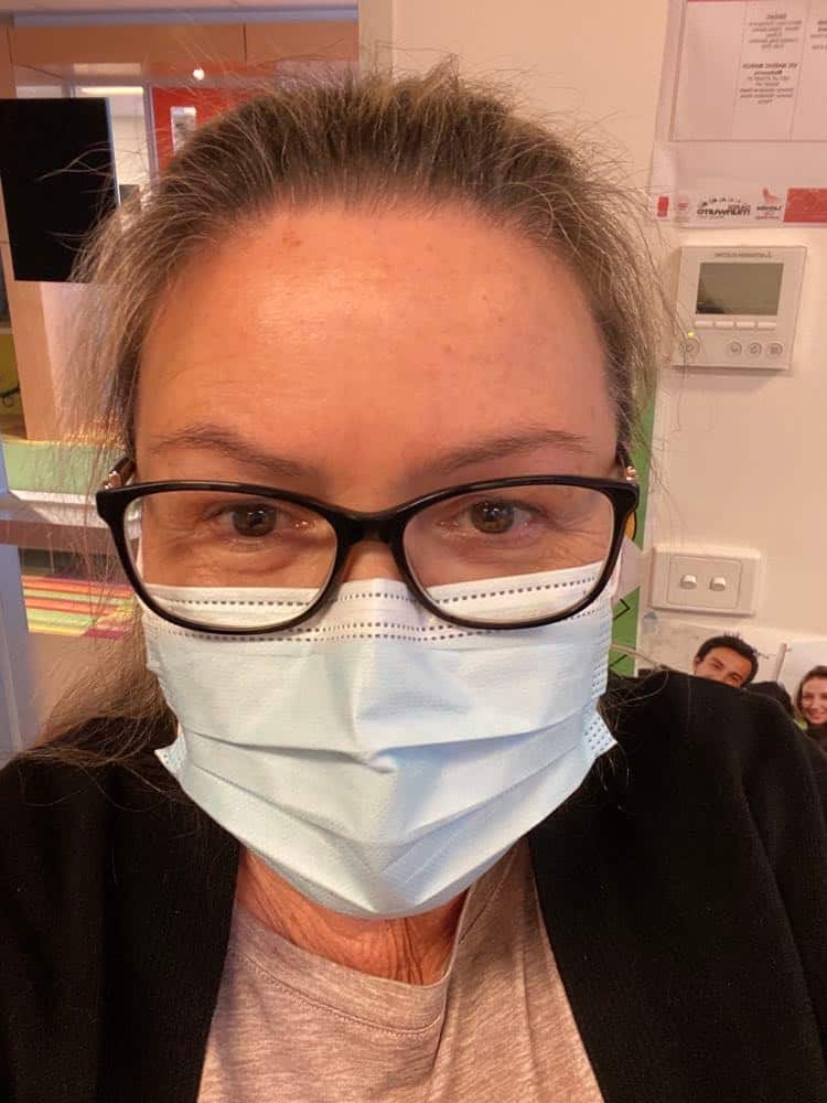 A woman wearing a face mask