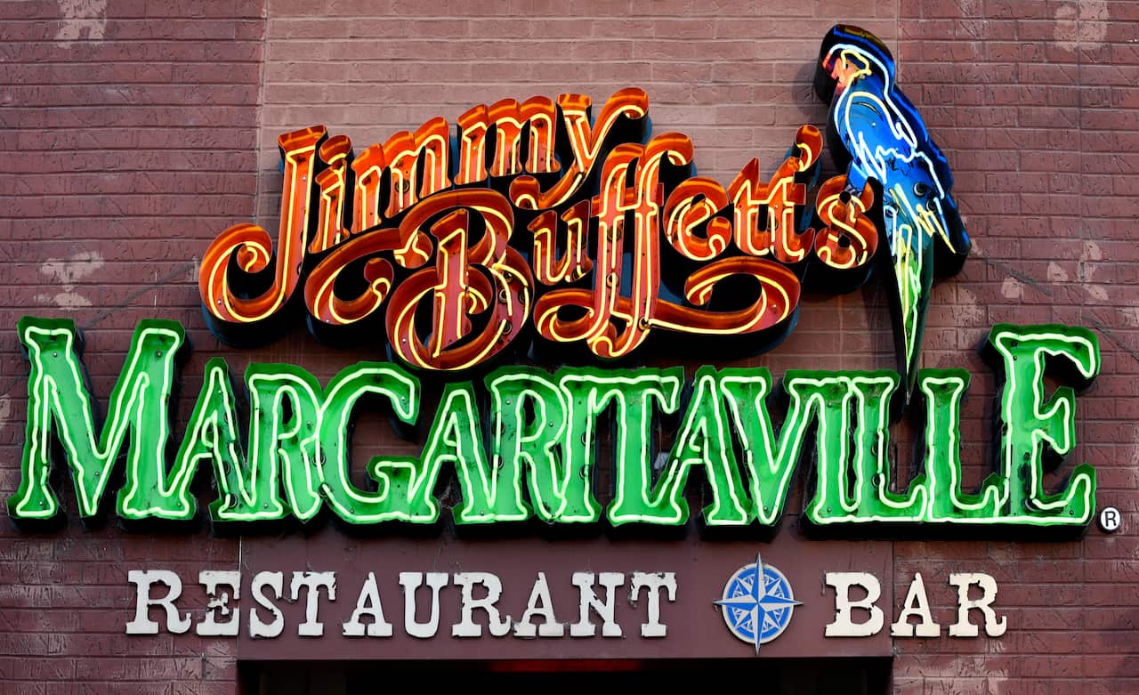 A neon sign that reads "Jimmy Buffett's Margaritaville".