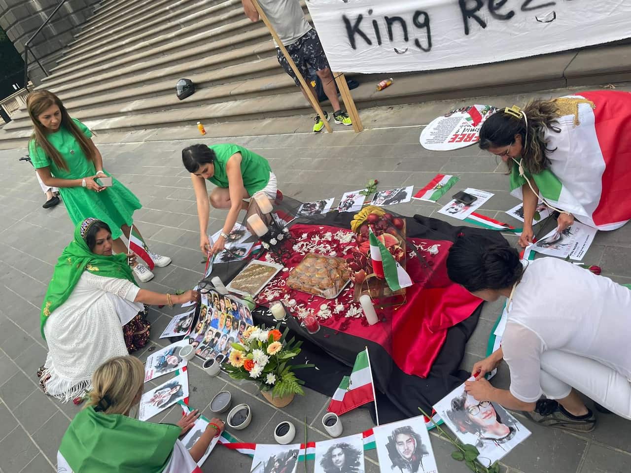 Women in Melbourne setting up Yalda table in memory of those who lost their life recently in Iran