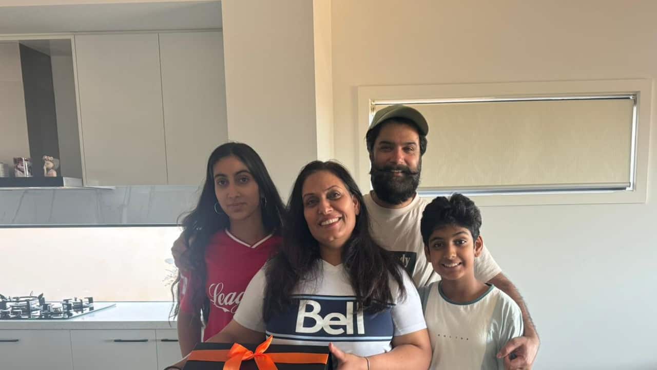 Bikramjit singh and his family in their new home..jpg