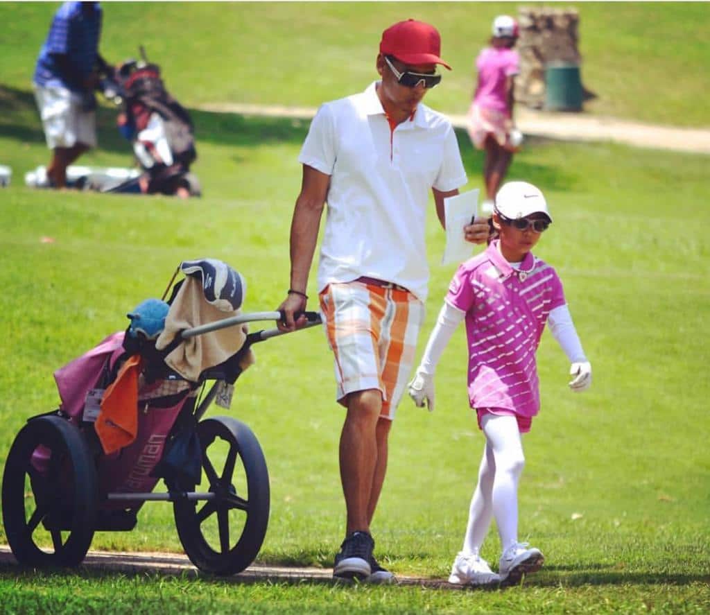 Jeneath Wong has always had her father Kenneth by her side on the green. 