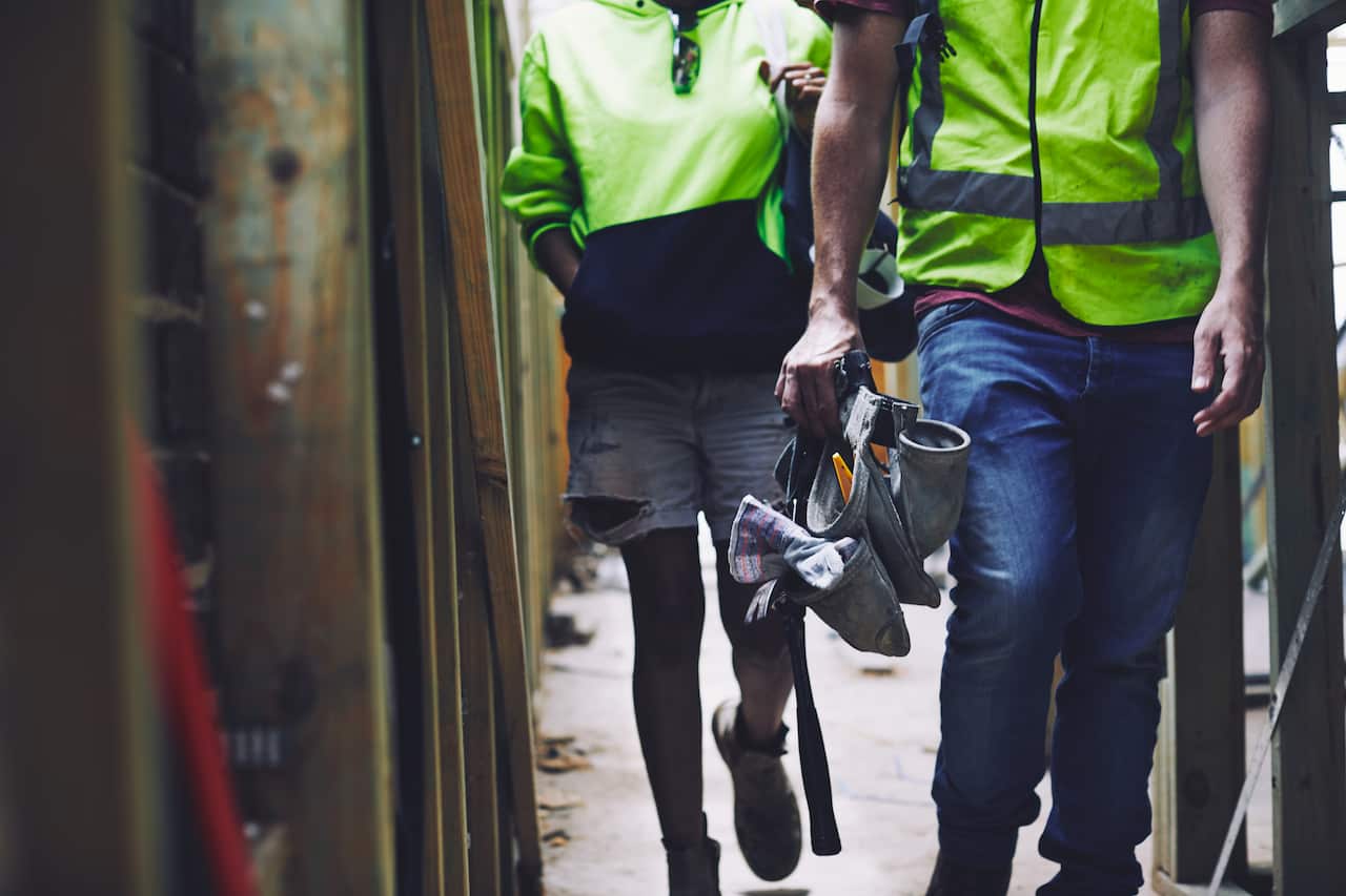 Construction industry worker arriving at work.