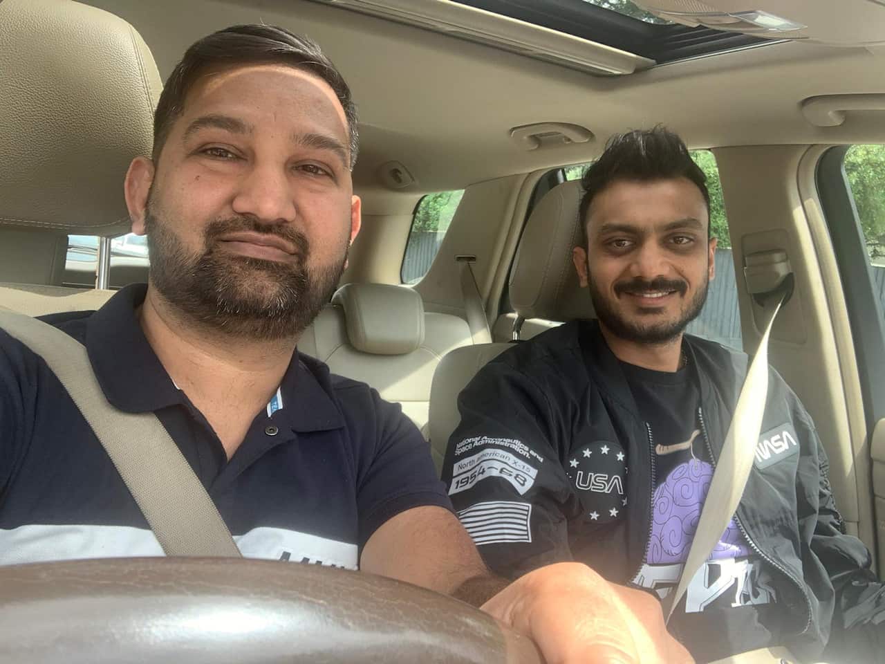 Bhavesh with Axar Patel.jpeg