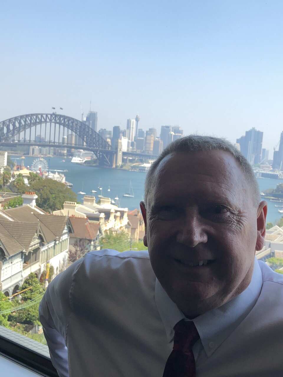 A selfie of Paul with Sydney Harbour in the background