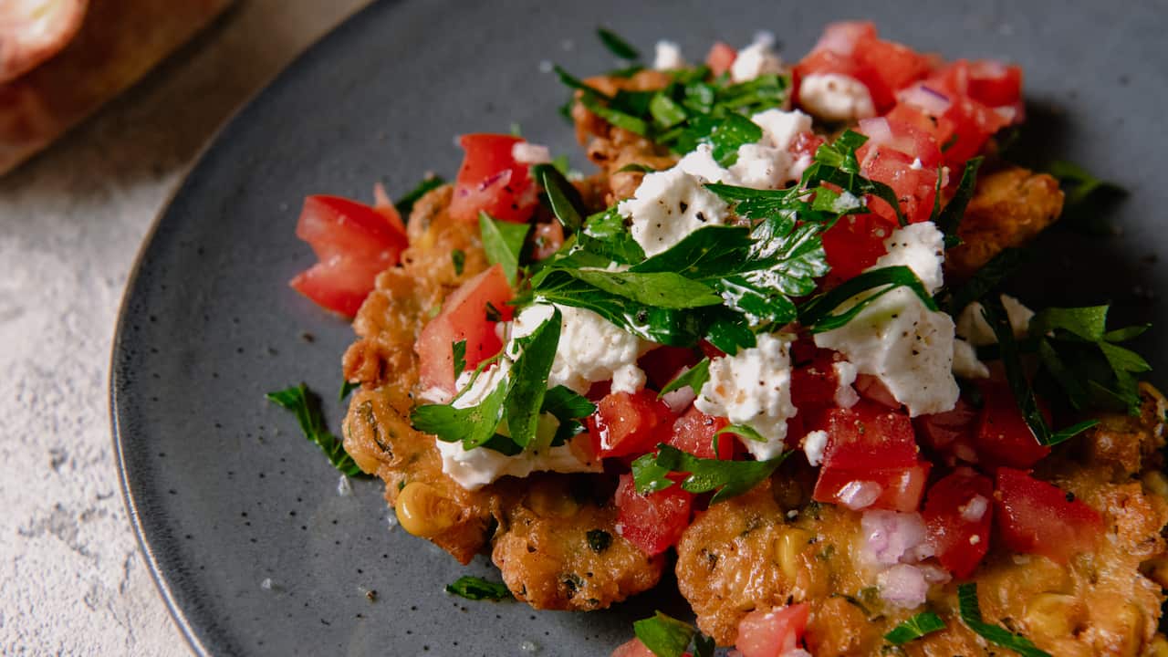 Corn fritters with pico de gallo and feta