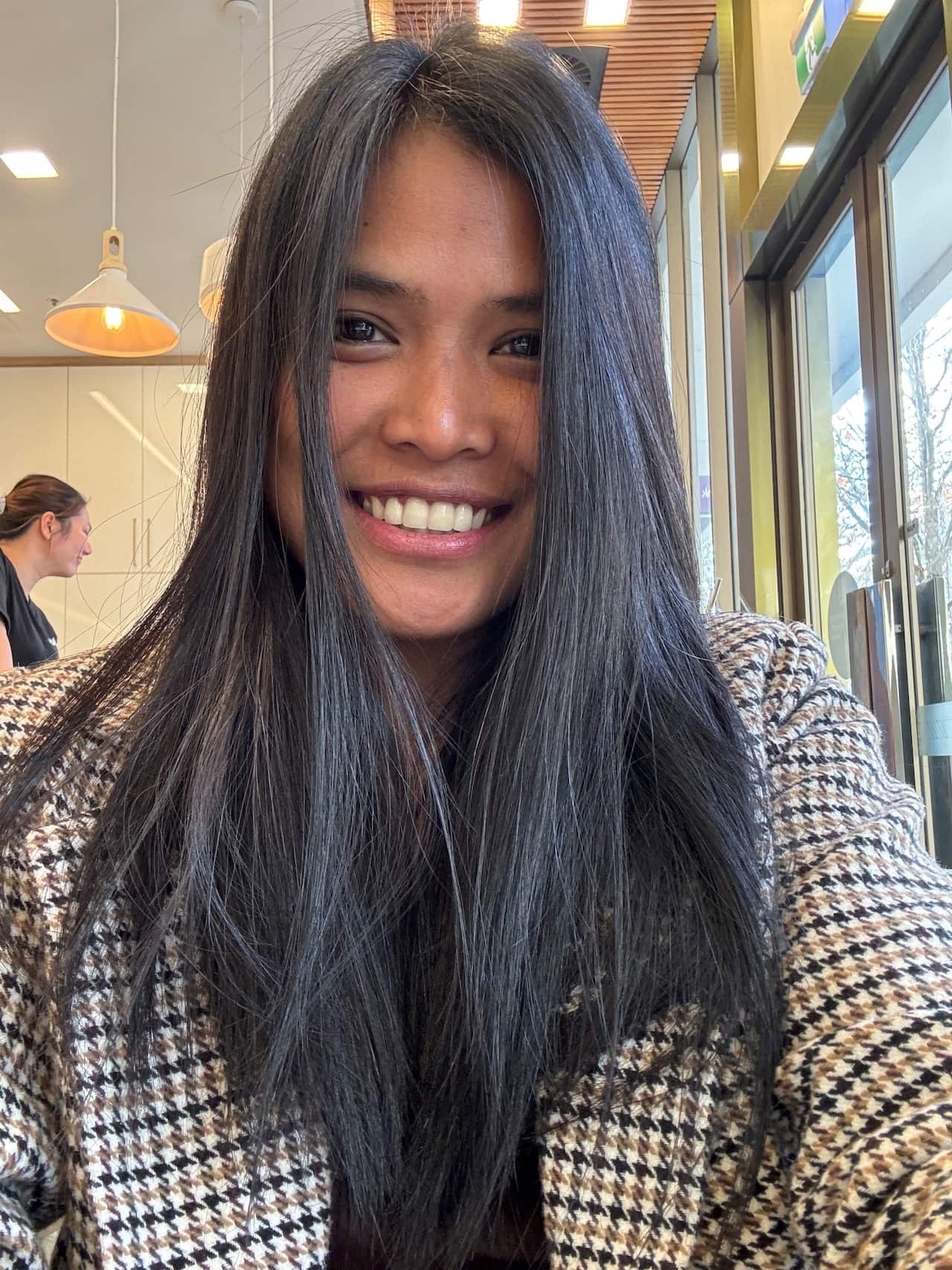 Grace Pude in office seating.jpg