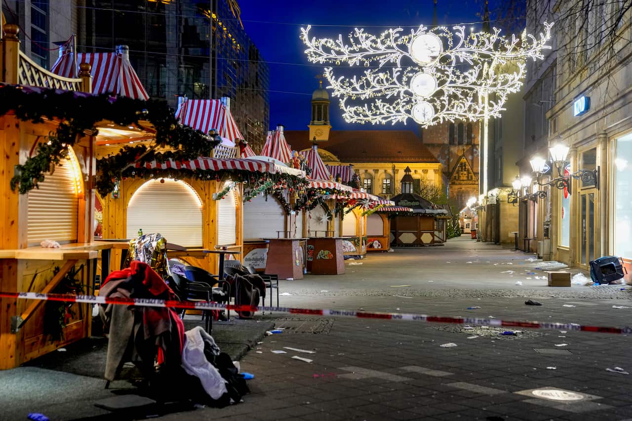 A Christmas market is shown empty.