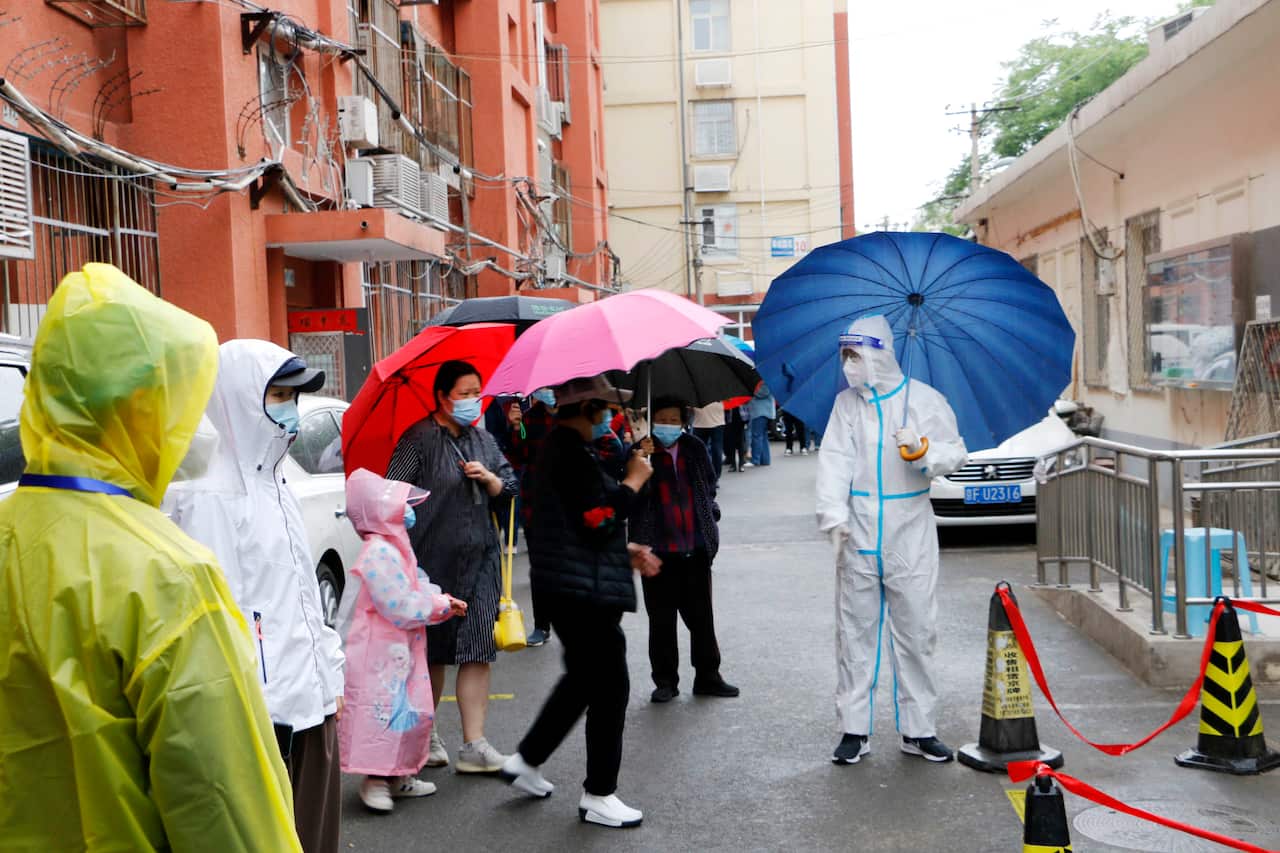 People waiting in line for a COVID-19 test.